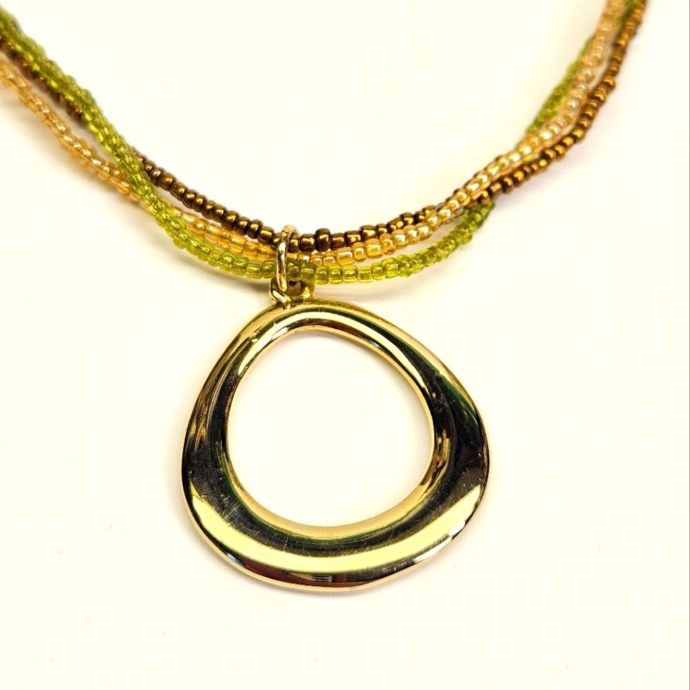 Gold Tone Pendant On Multistrand Seed Beaded Necklace